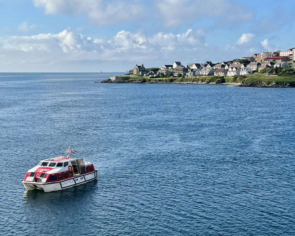 A tender boat going ashore at Lerwick, Shetland